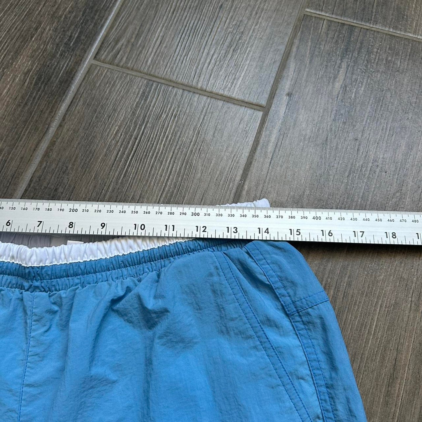 Adidas blue shorts with white