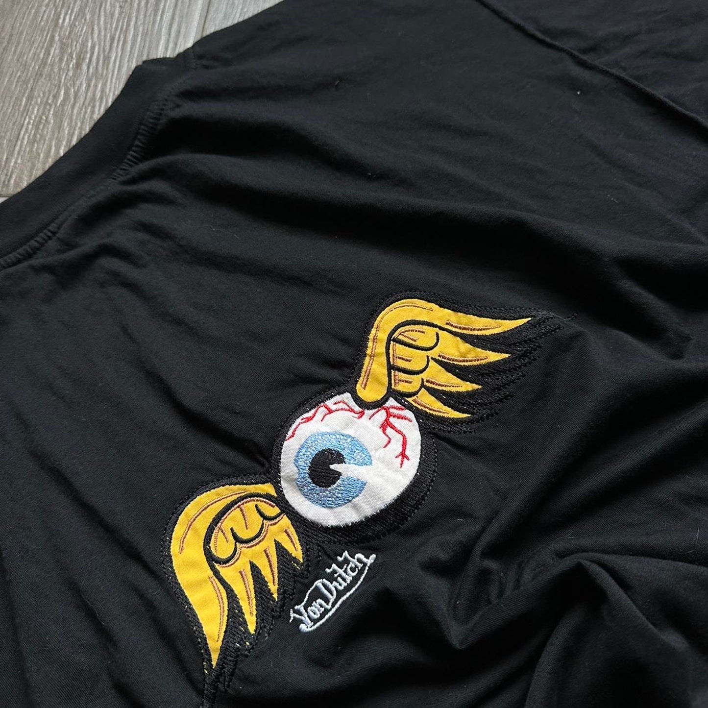 Black Von Dutch tee with yellow and white details