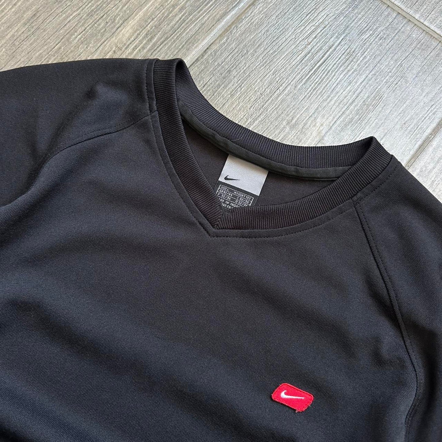 Nike black tee with red swoosh Size L