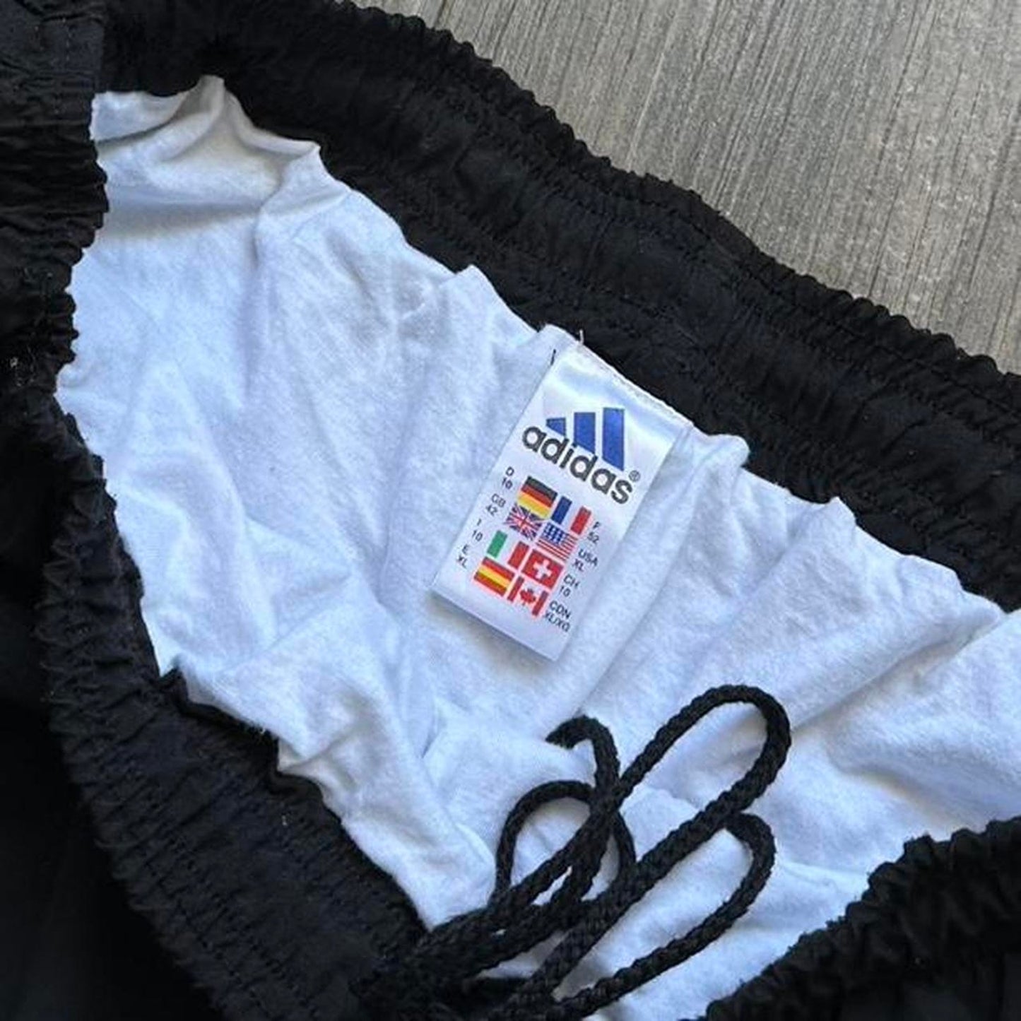 Adidas black shorts with white