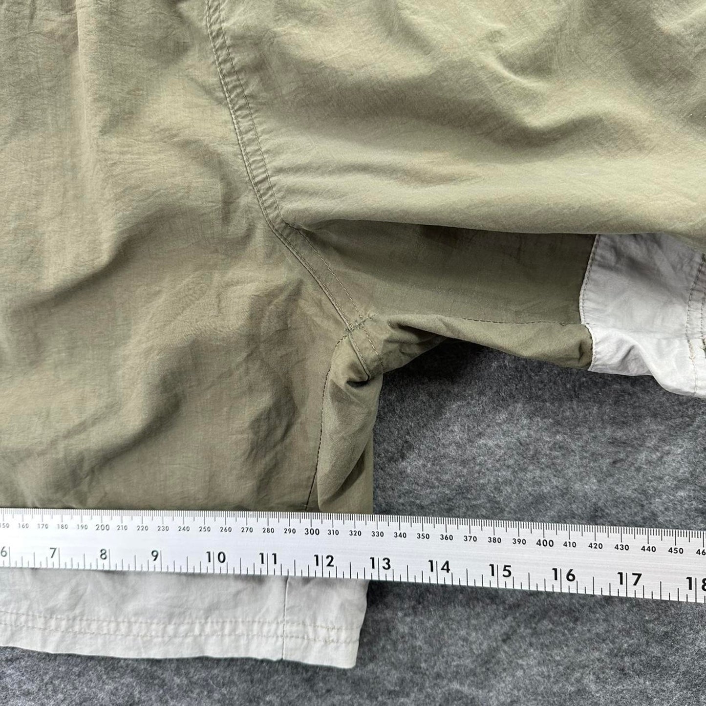 Reebok khaki shorts with white