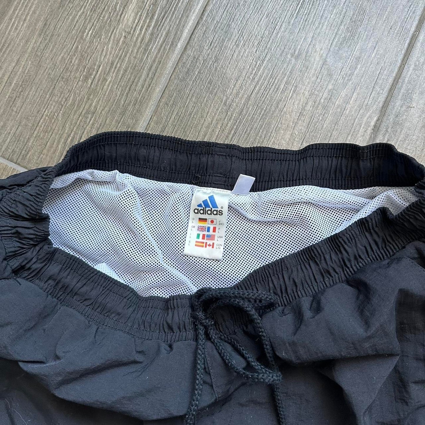 Adidas black shorts with white