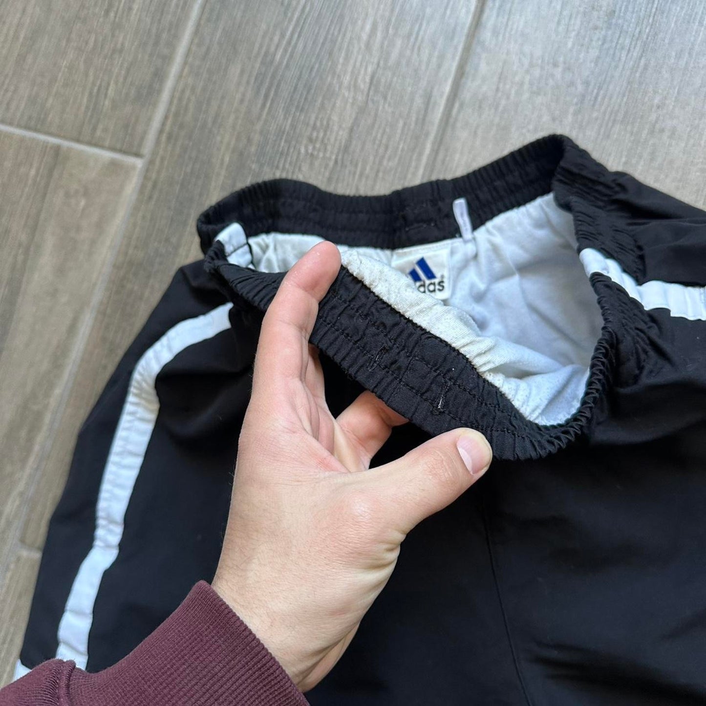 Adidas black shorts with white stripes