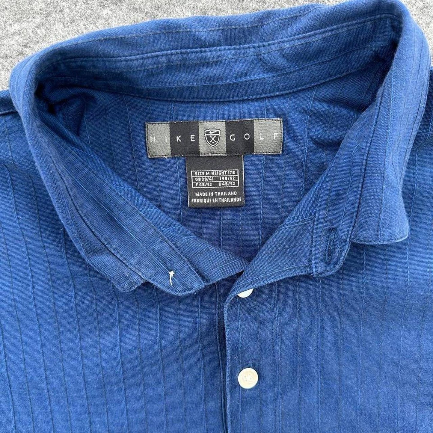 Nike golf blue polo shirt