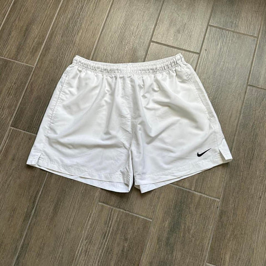 Nike white shorts with black swoosh