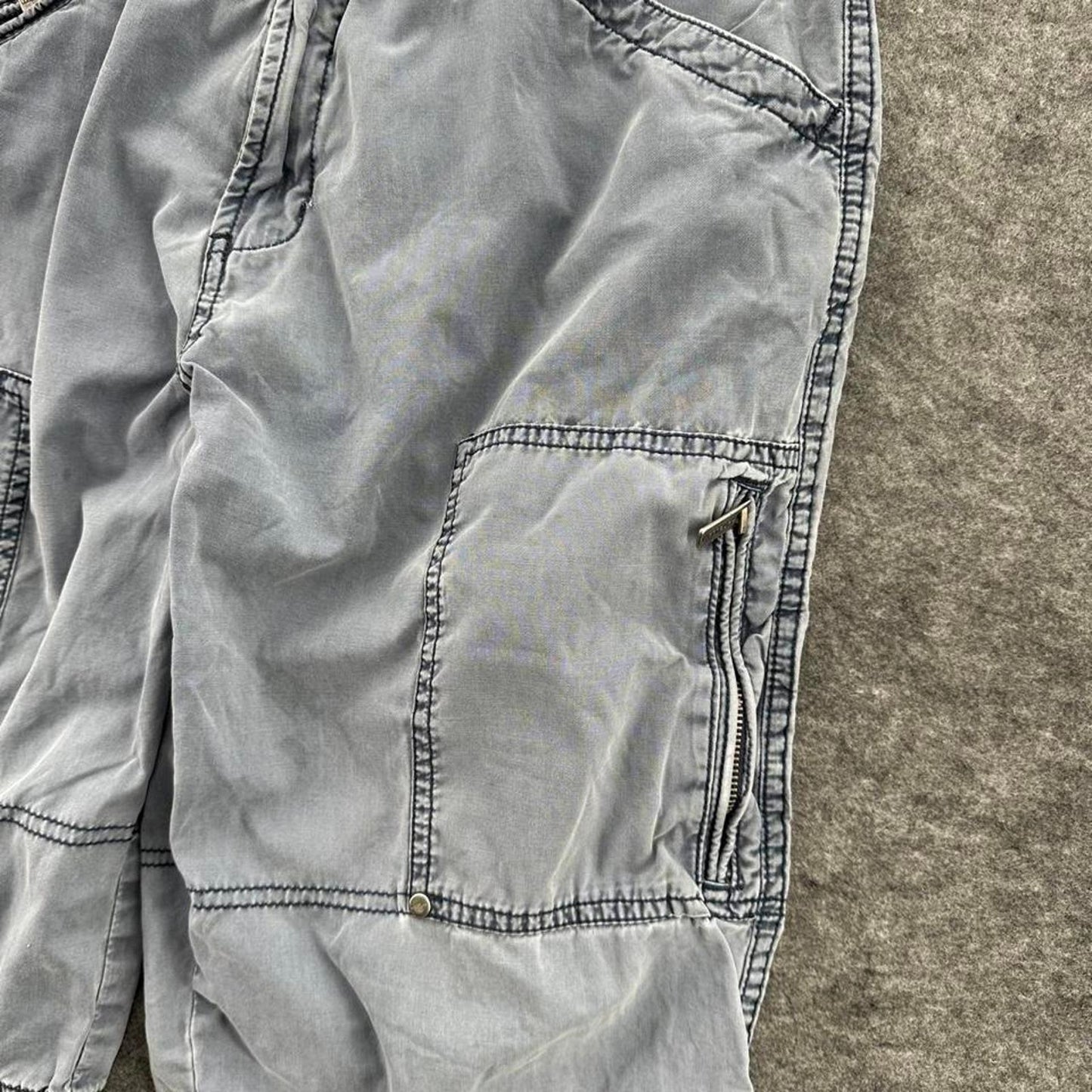 Grey cargo shorts with multiple