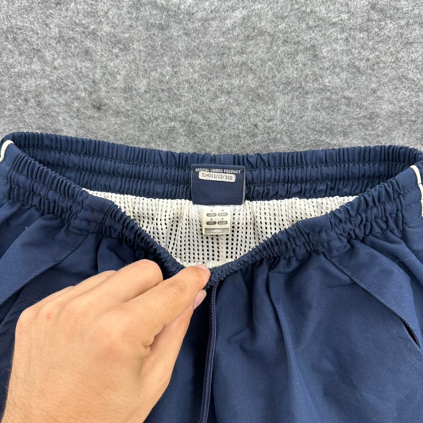 Navy umbro track shorts with