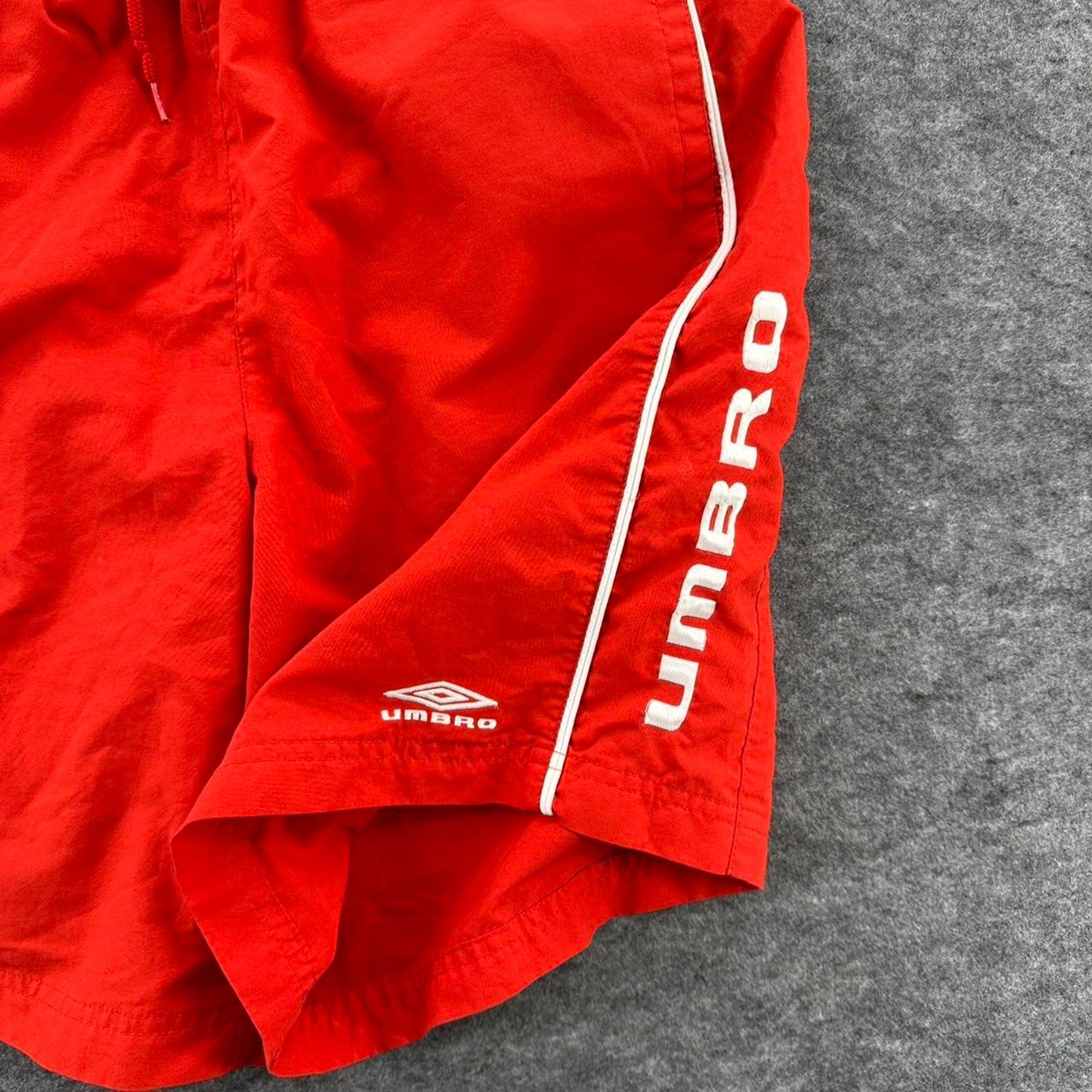 Umbro red swim shorts with