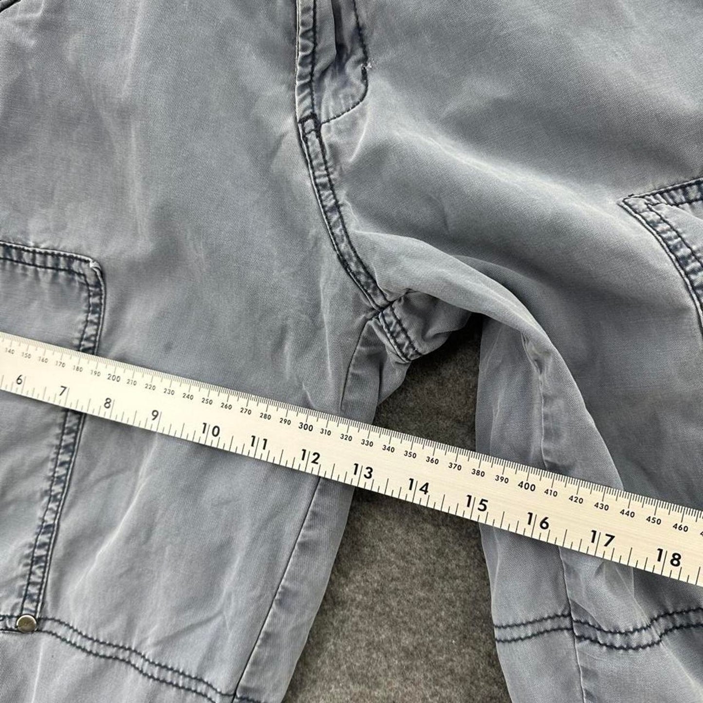 Grey cargo shorts with multiple