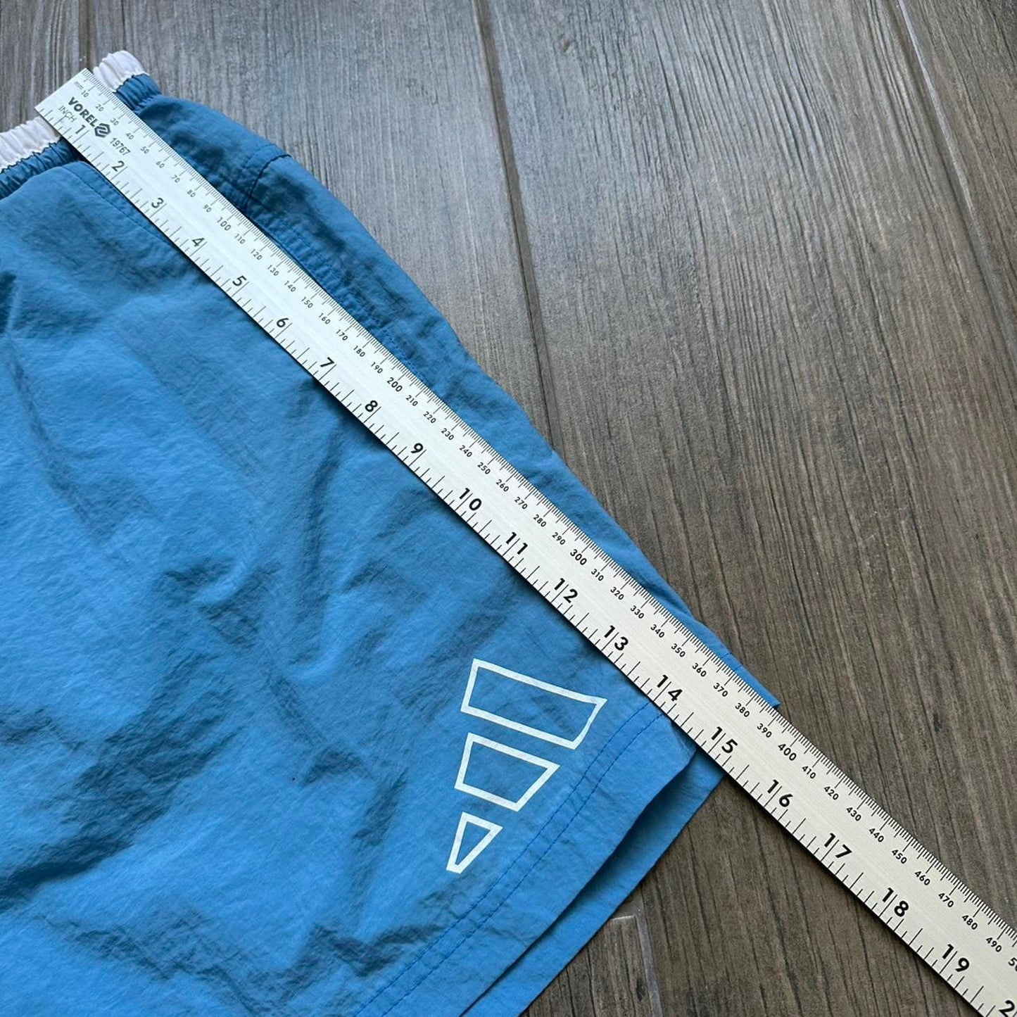 Adidas blue shorts with white