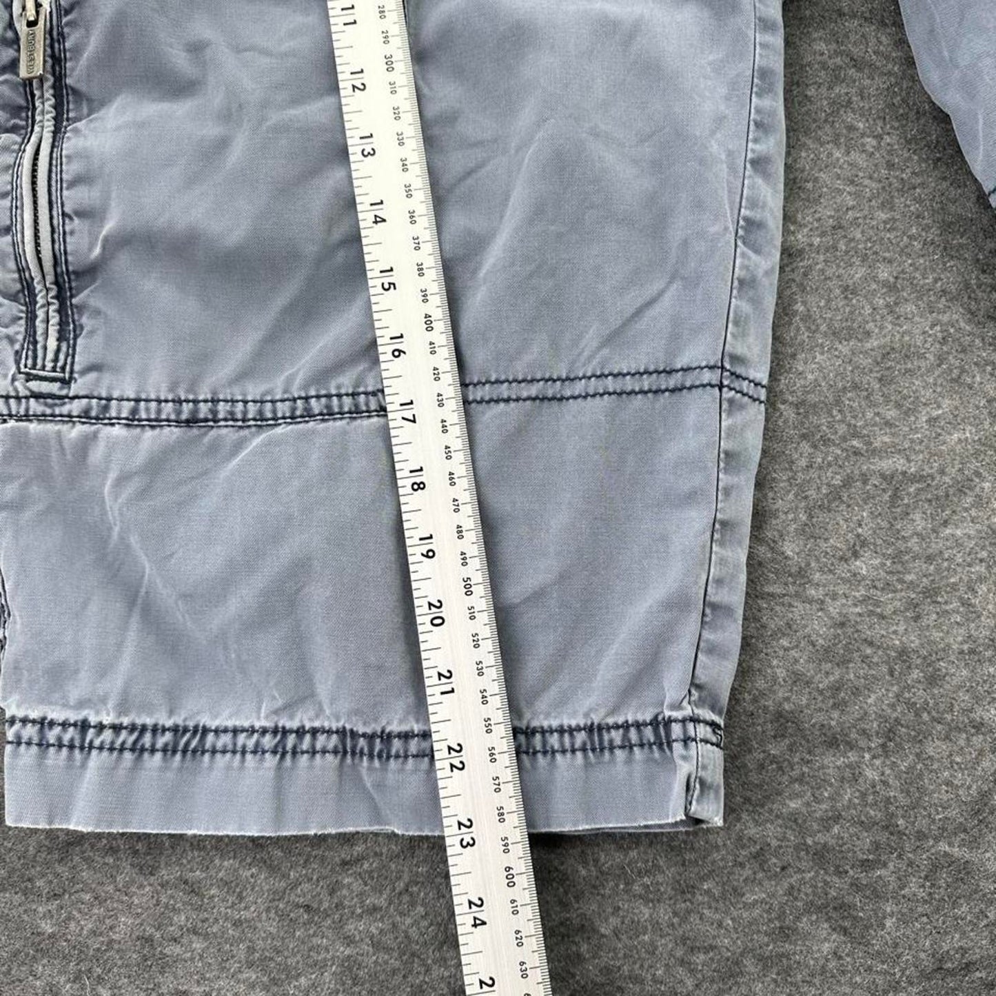 Grey cargo shorts with multiple