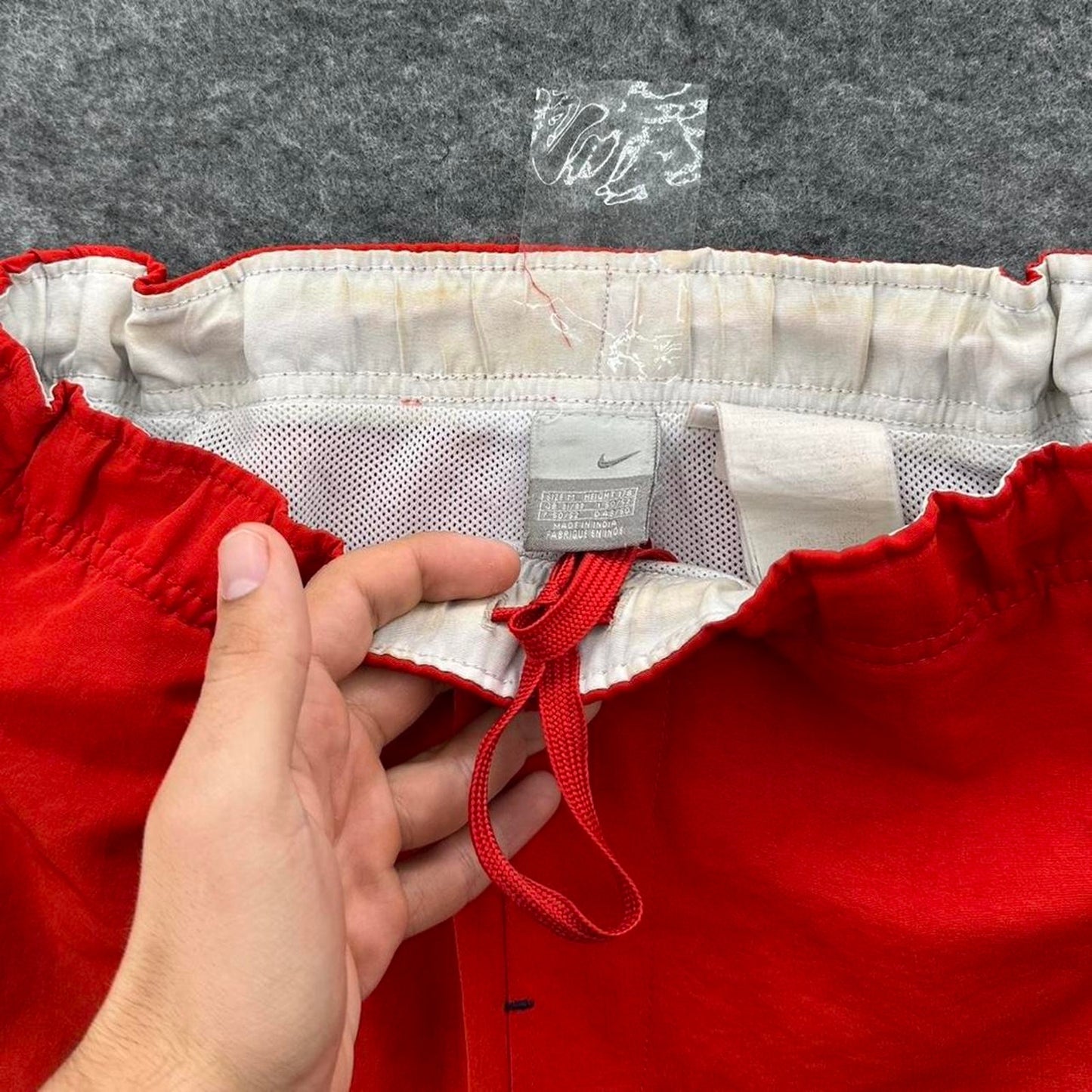 Nike red shorts with white