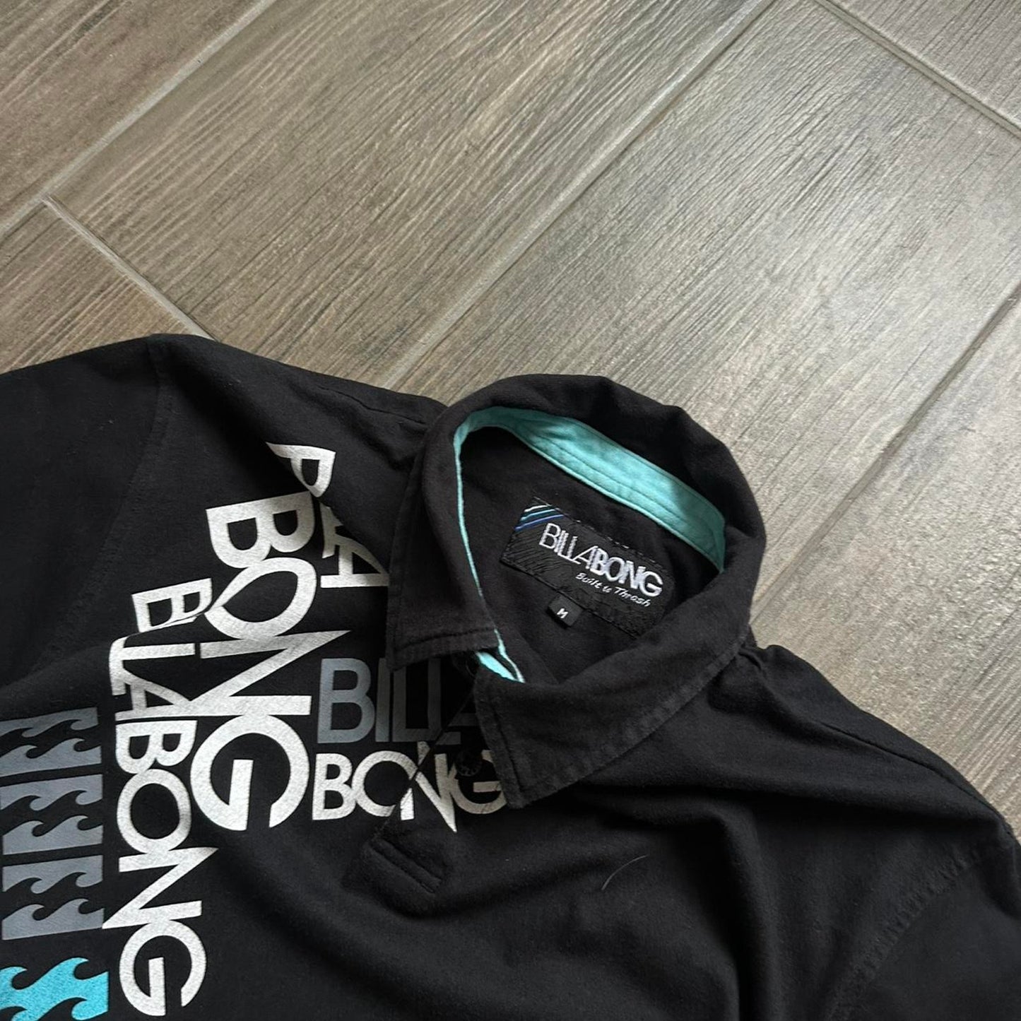 Billabong black polo shirt with