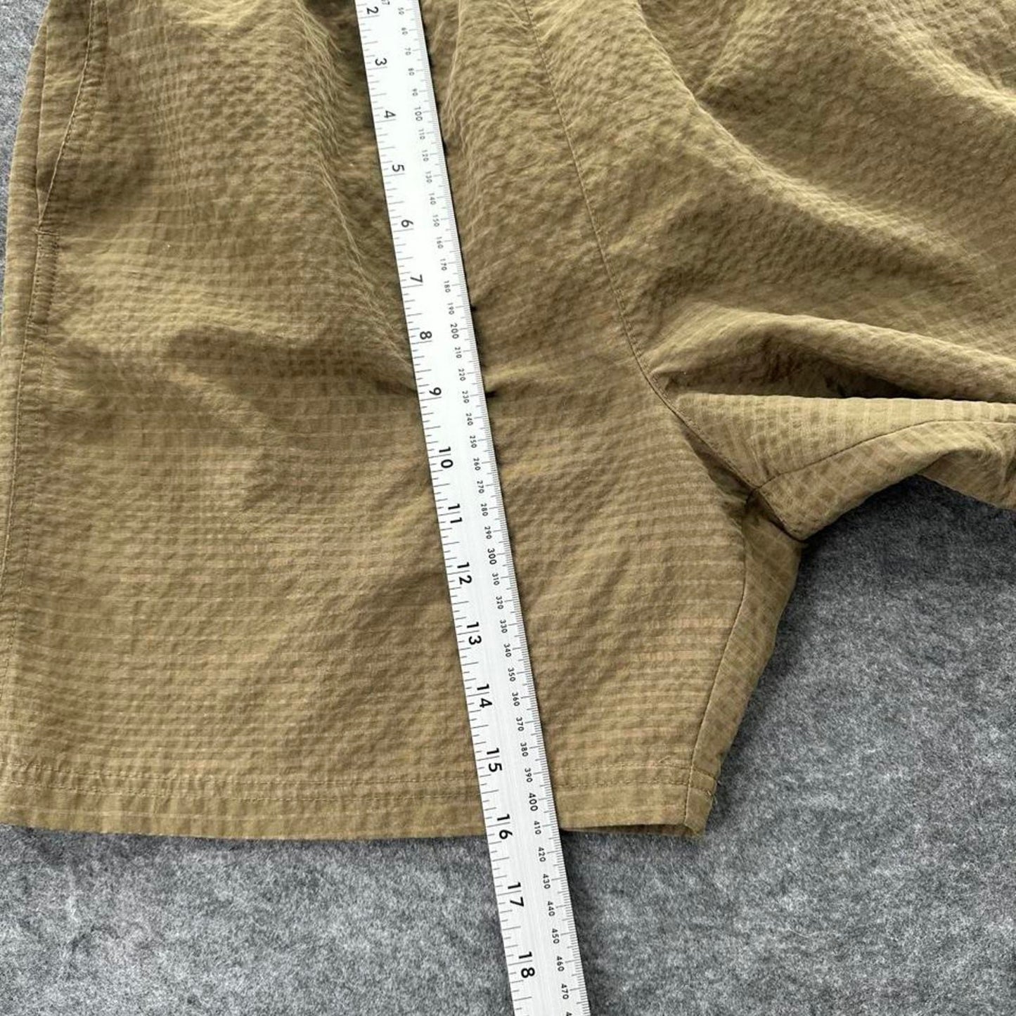 Nike brown shorts with white