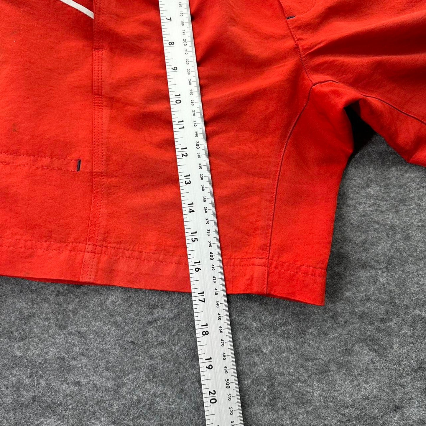 Nike red shorts with white