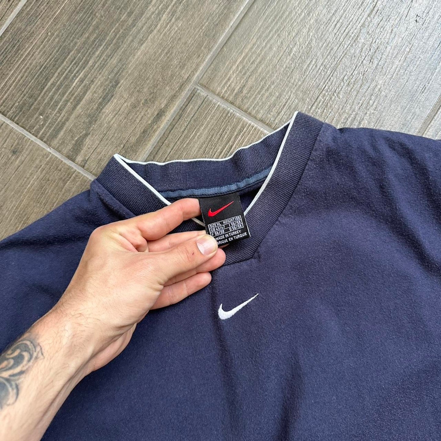 Nike navy blue V-neck t-shirt with white accents