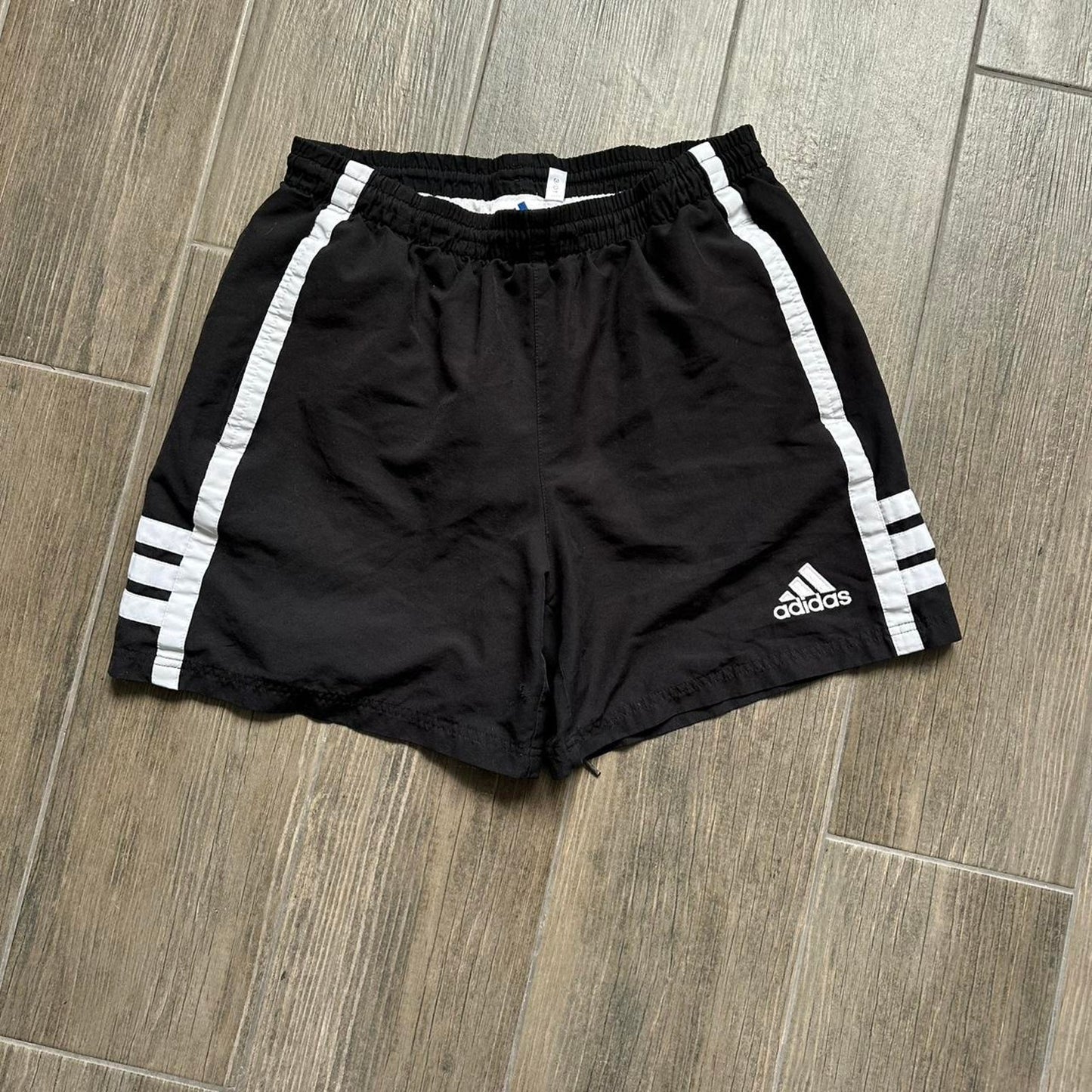 Adidas black shorts with white stripes