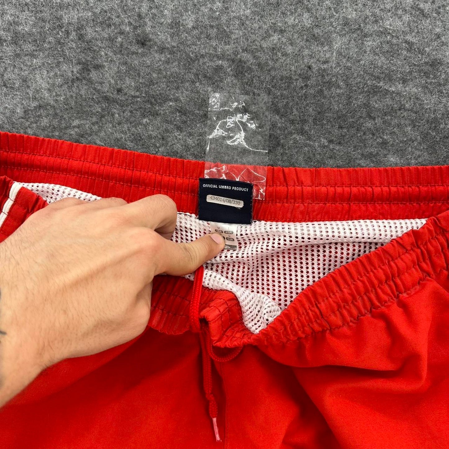 Umbro red swim shorts with