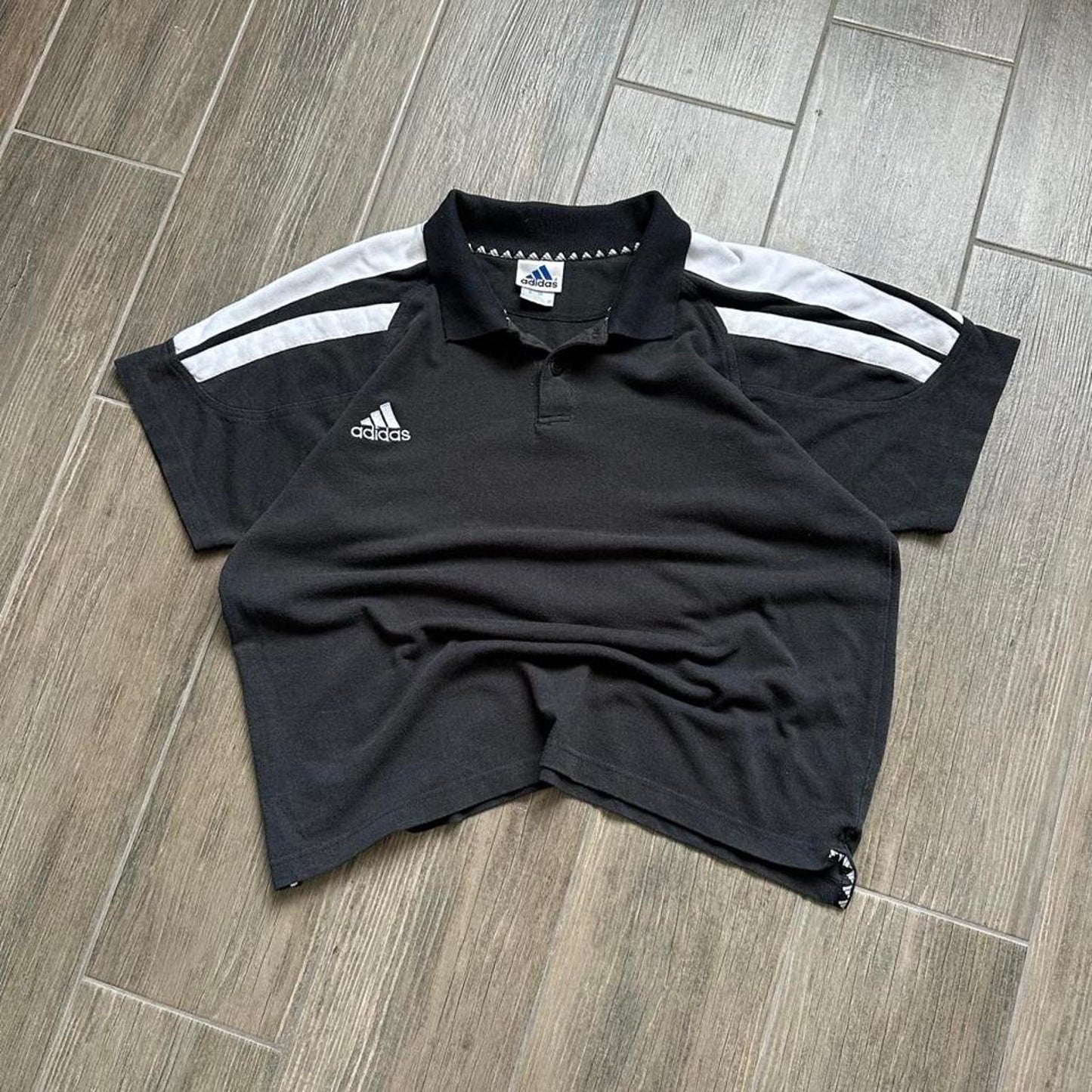 Adidas black polo shirt with