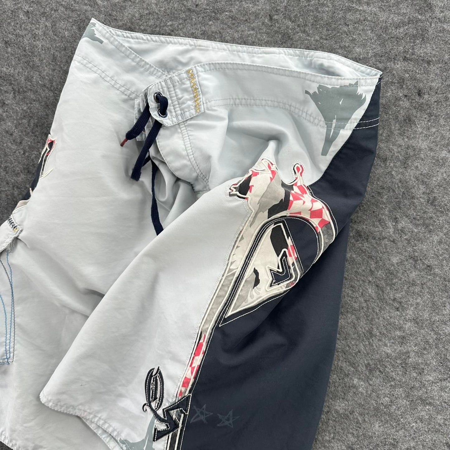 Quiksilver white board shorts with