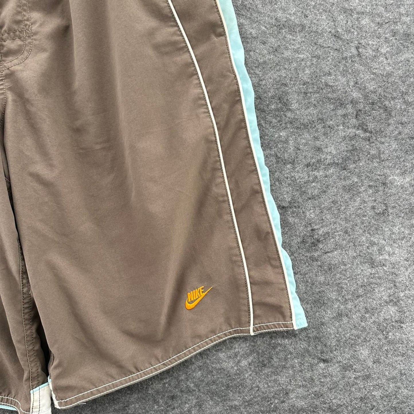 Nike brown shorts with light