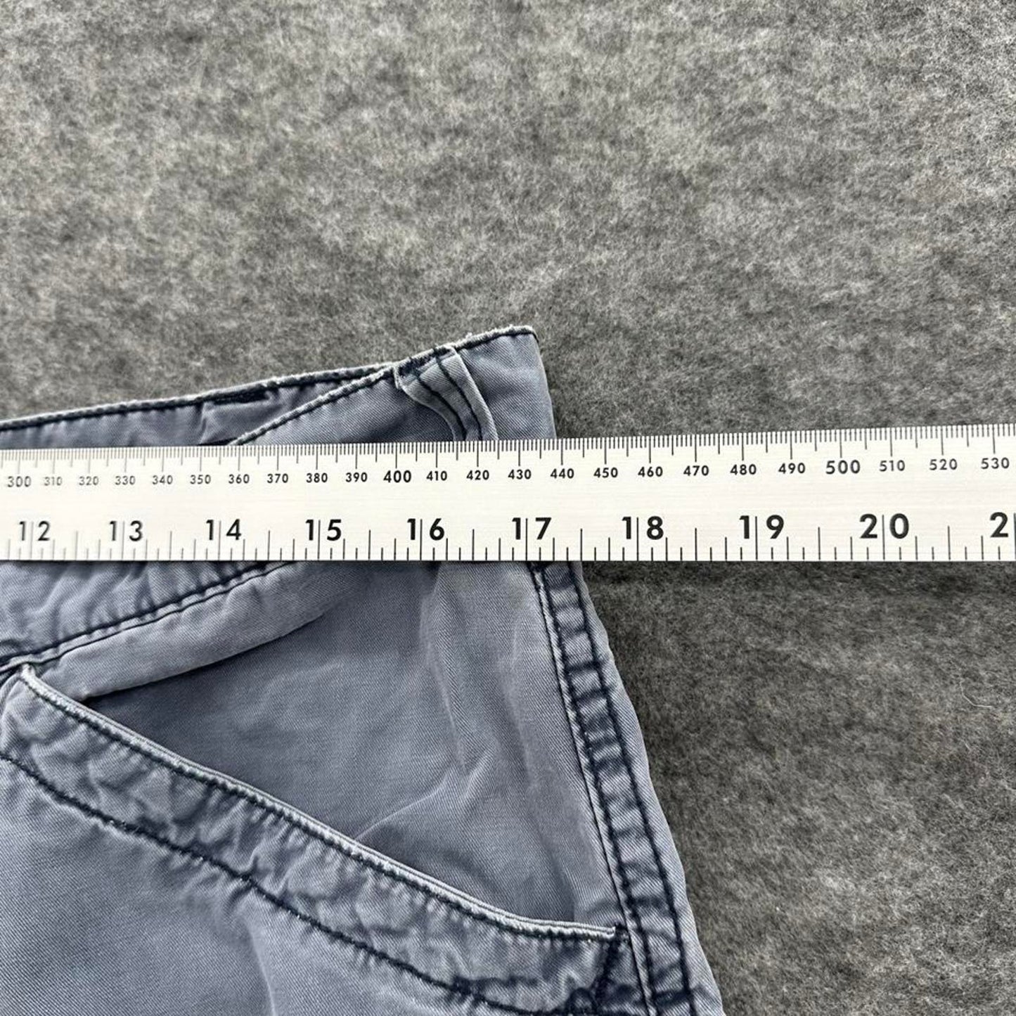 Grey cargo shorts with multiple
