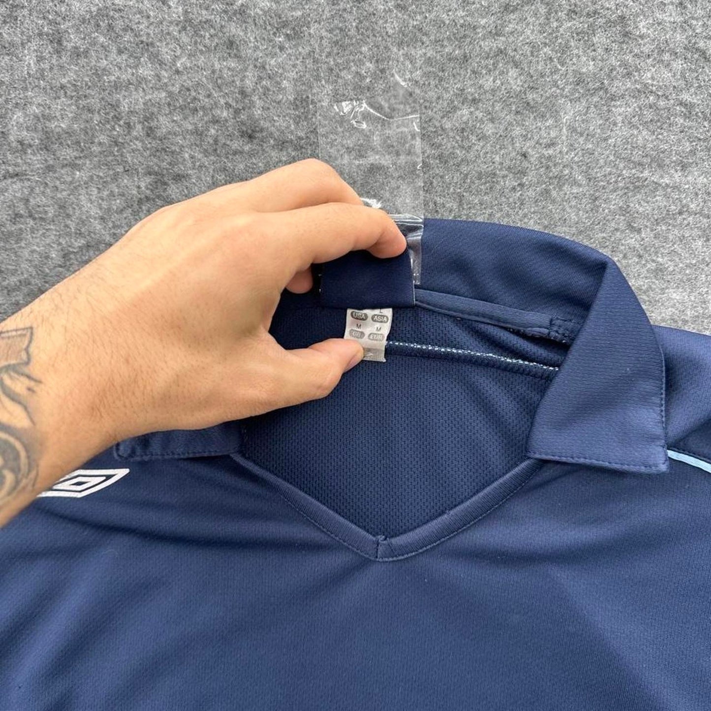 Navy blue umbro polo shirt