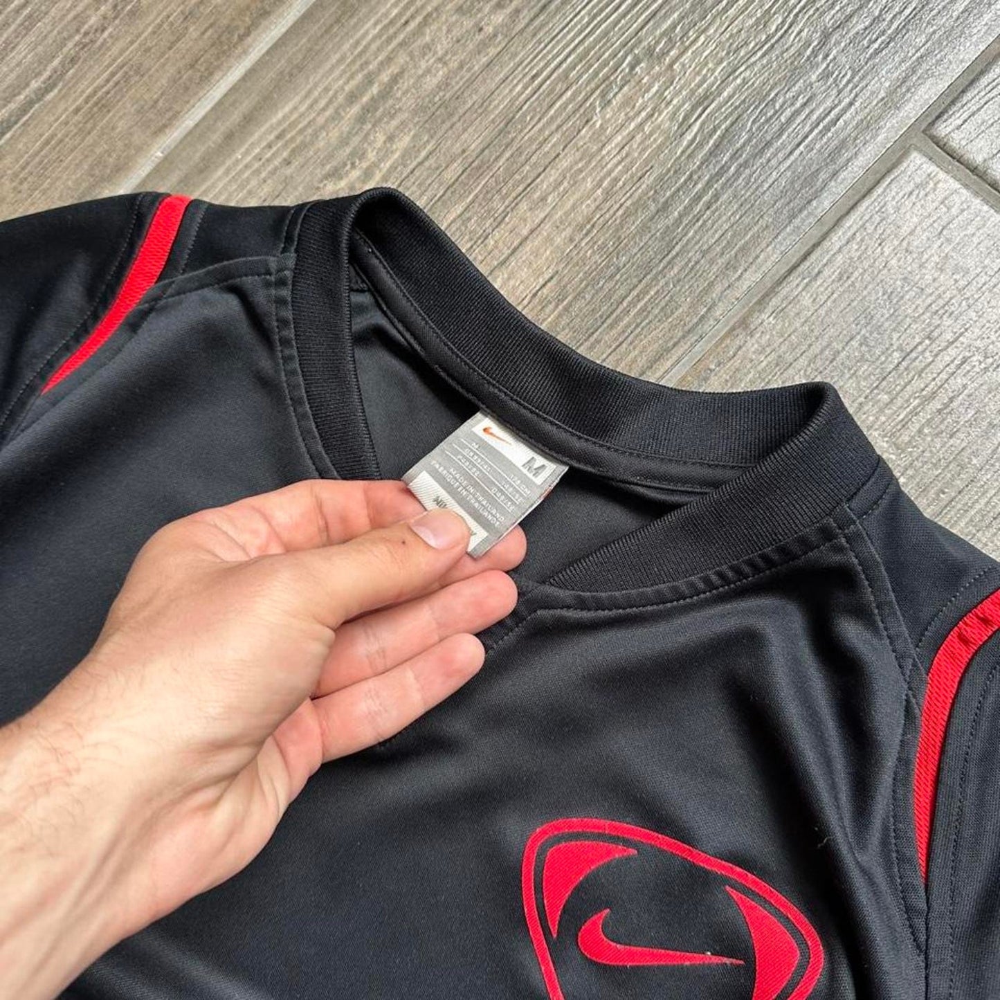 Nike black and red soccer jersey