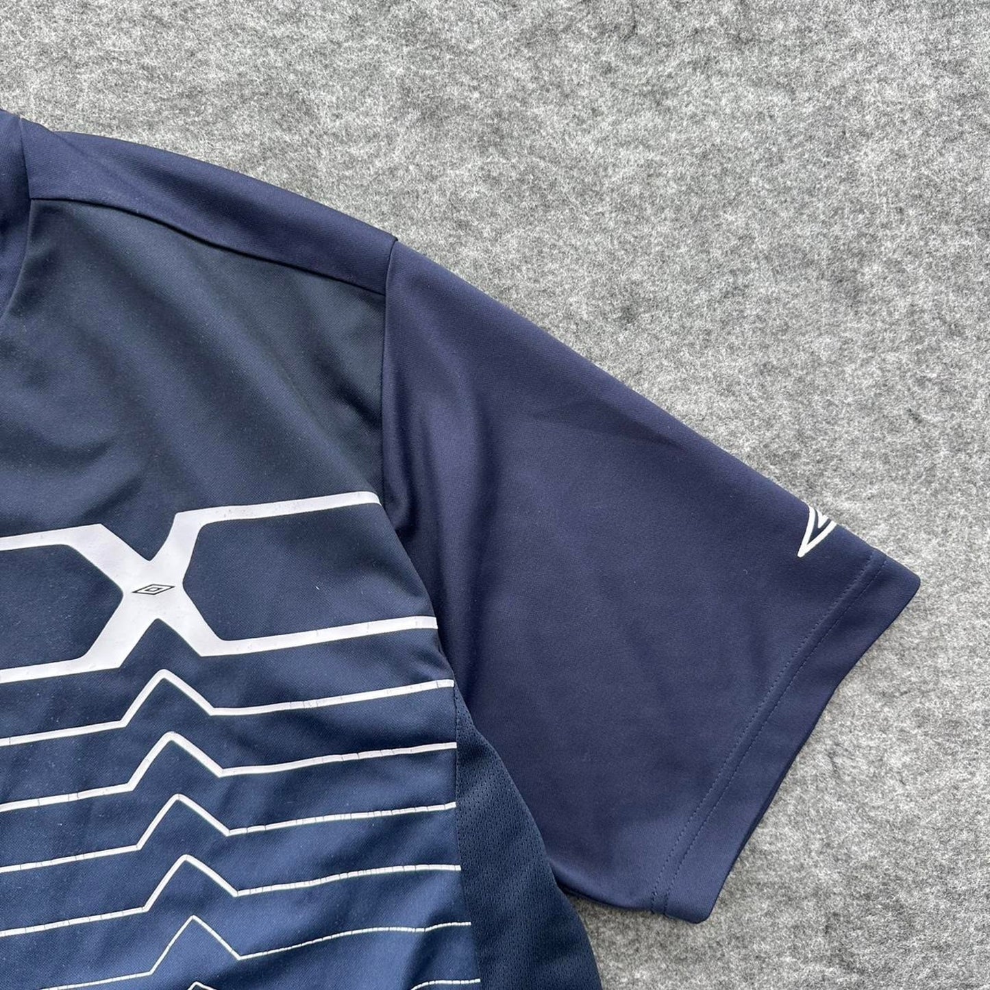 Umbro navy blue jersey with