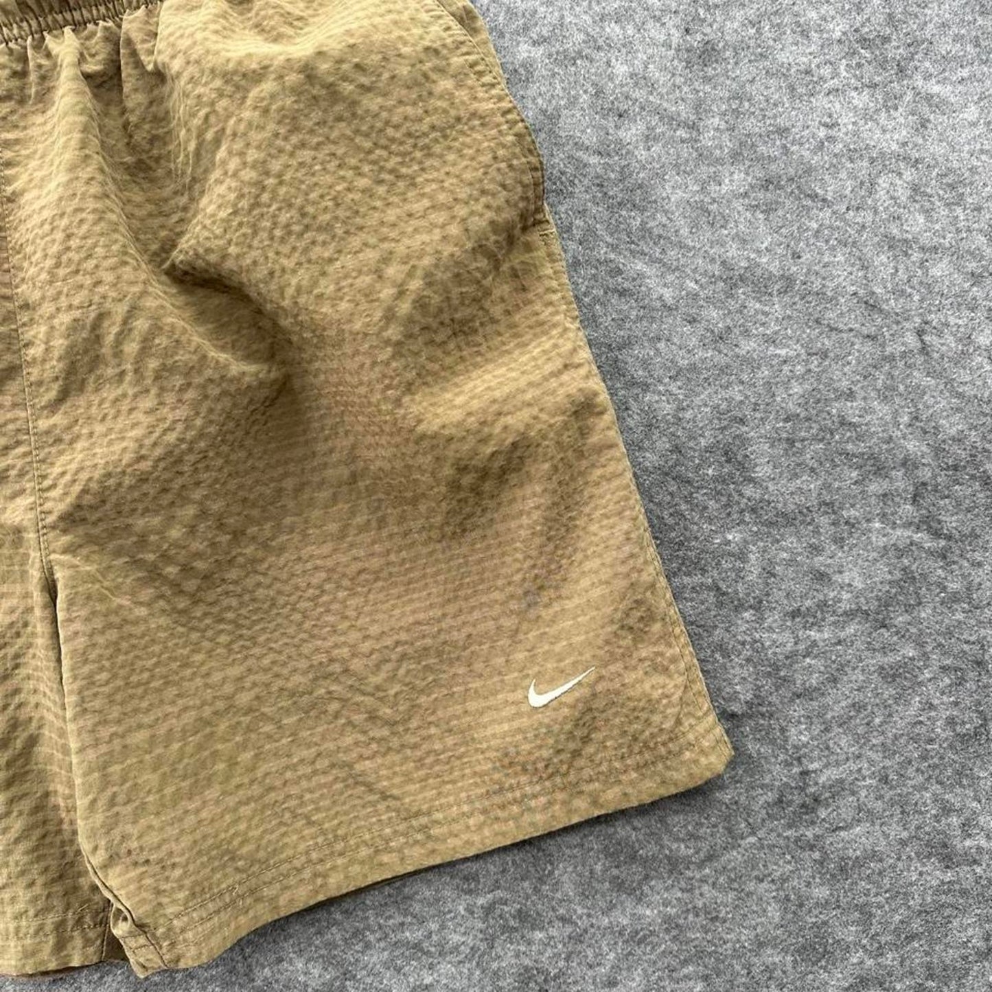 Nike brown shorts with white