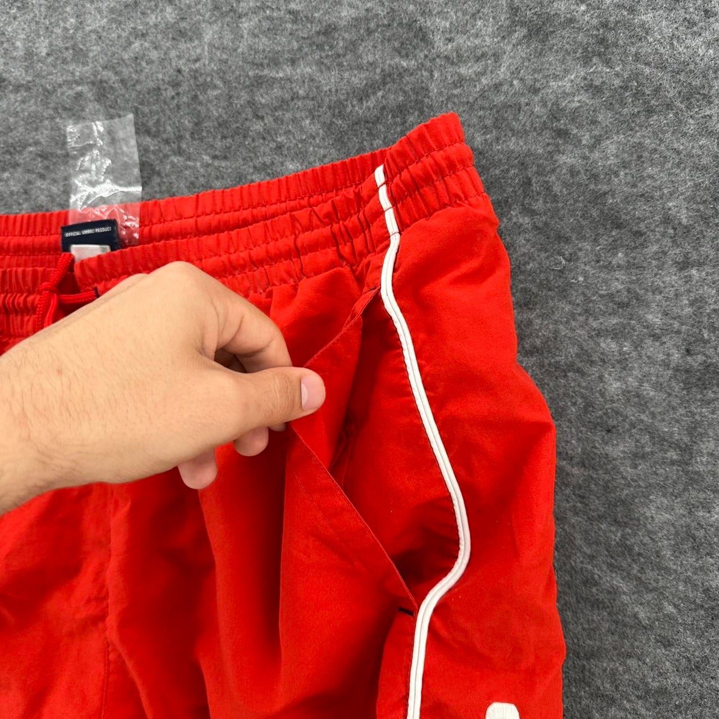Umbro red swim shorts with