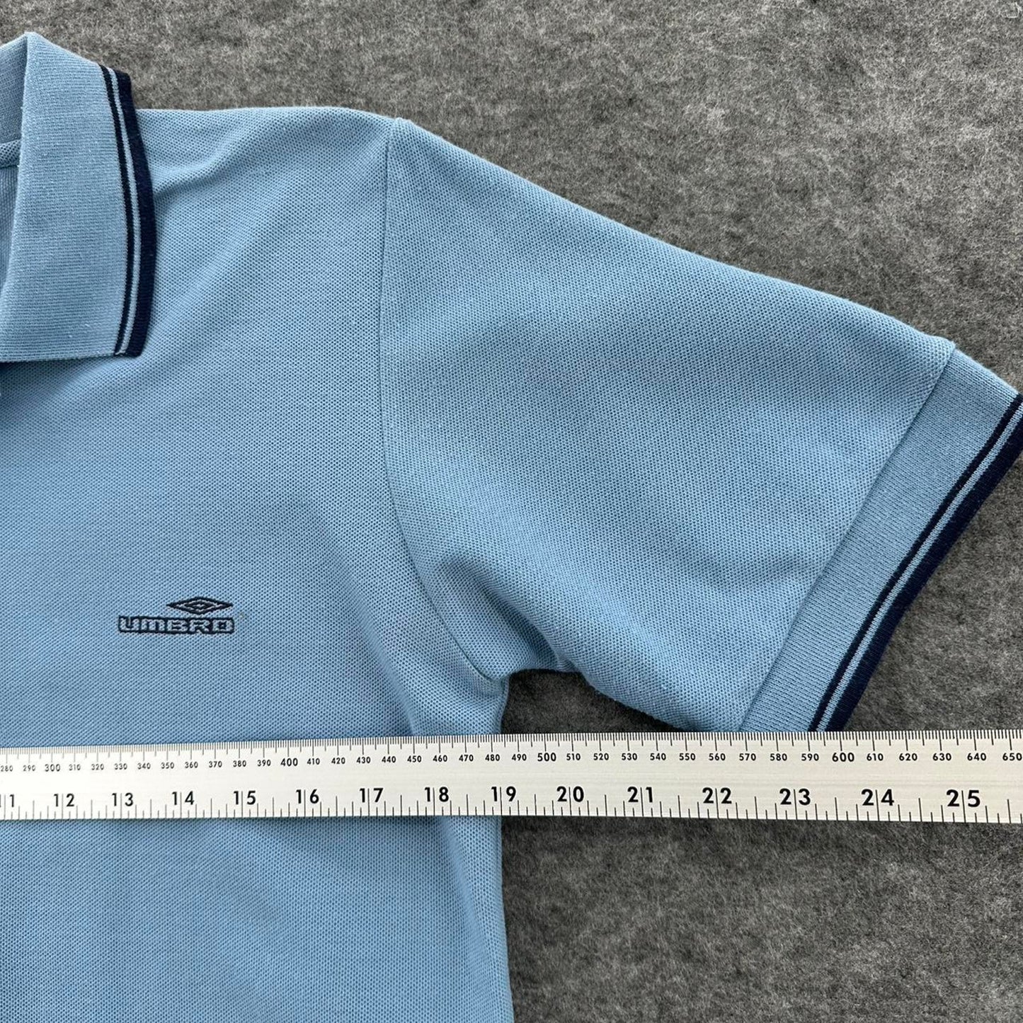 Umbro blue polo shirt
