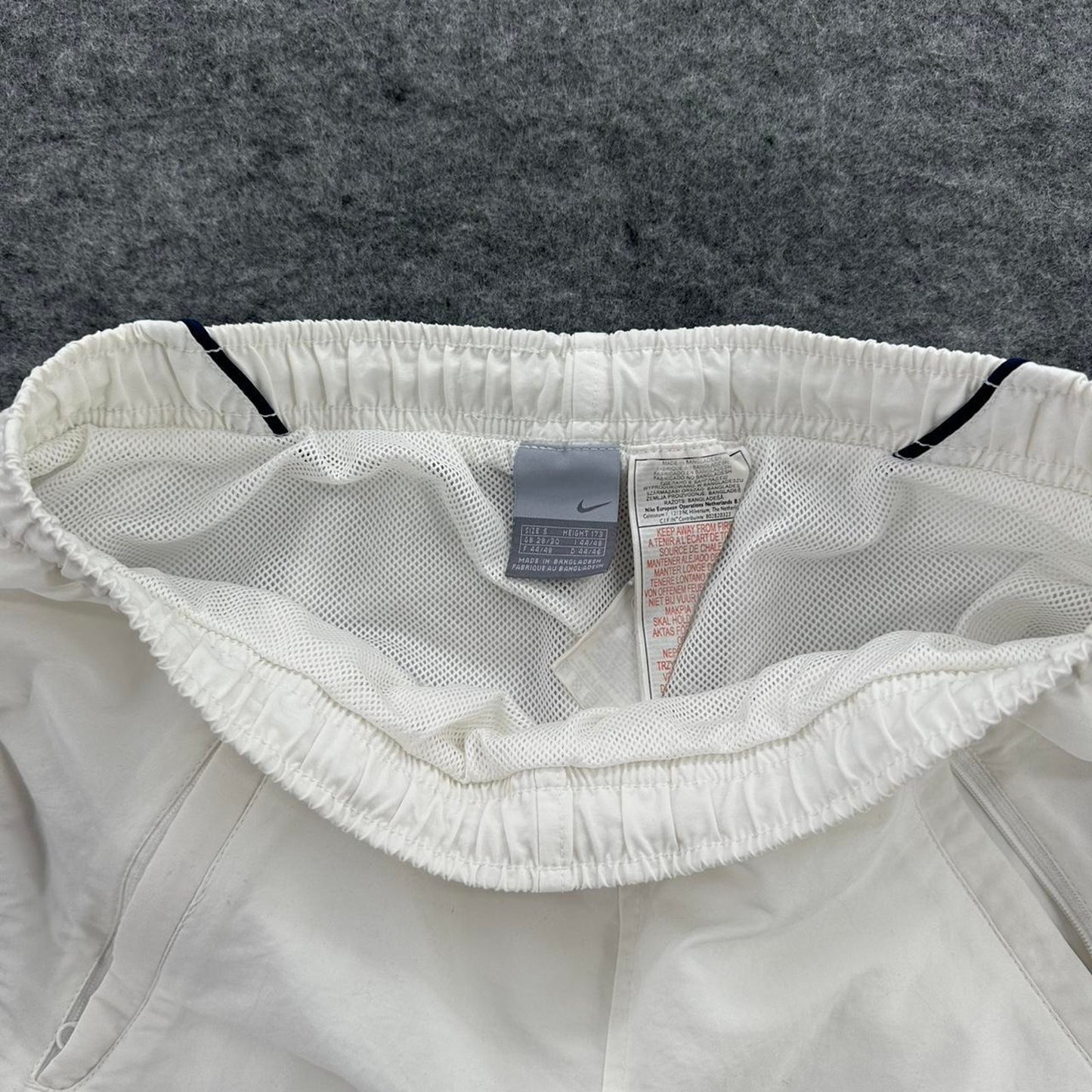 Nike white shorts with red