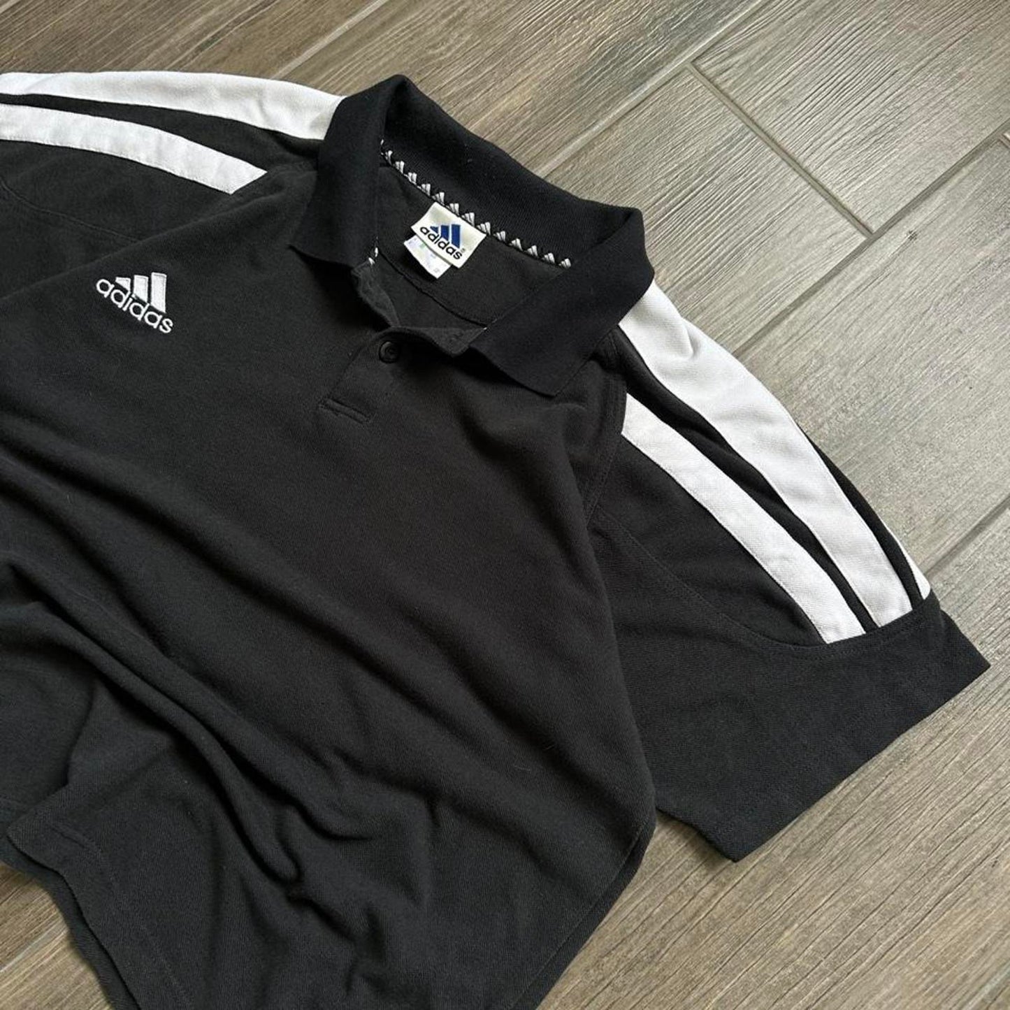 Adidas black polo shirt with
