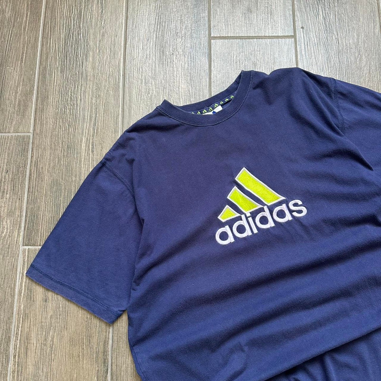 Adidas navy blue t-shirt with yellow and white logo
