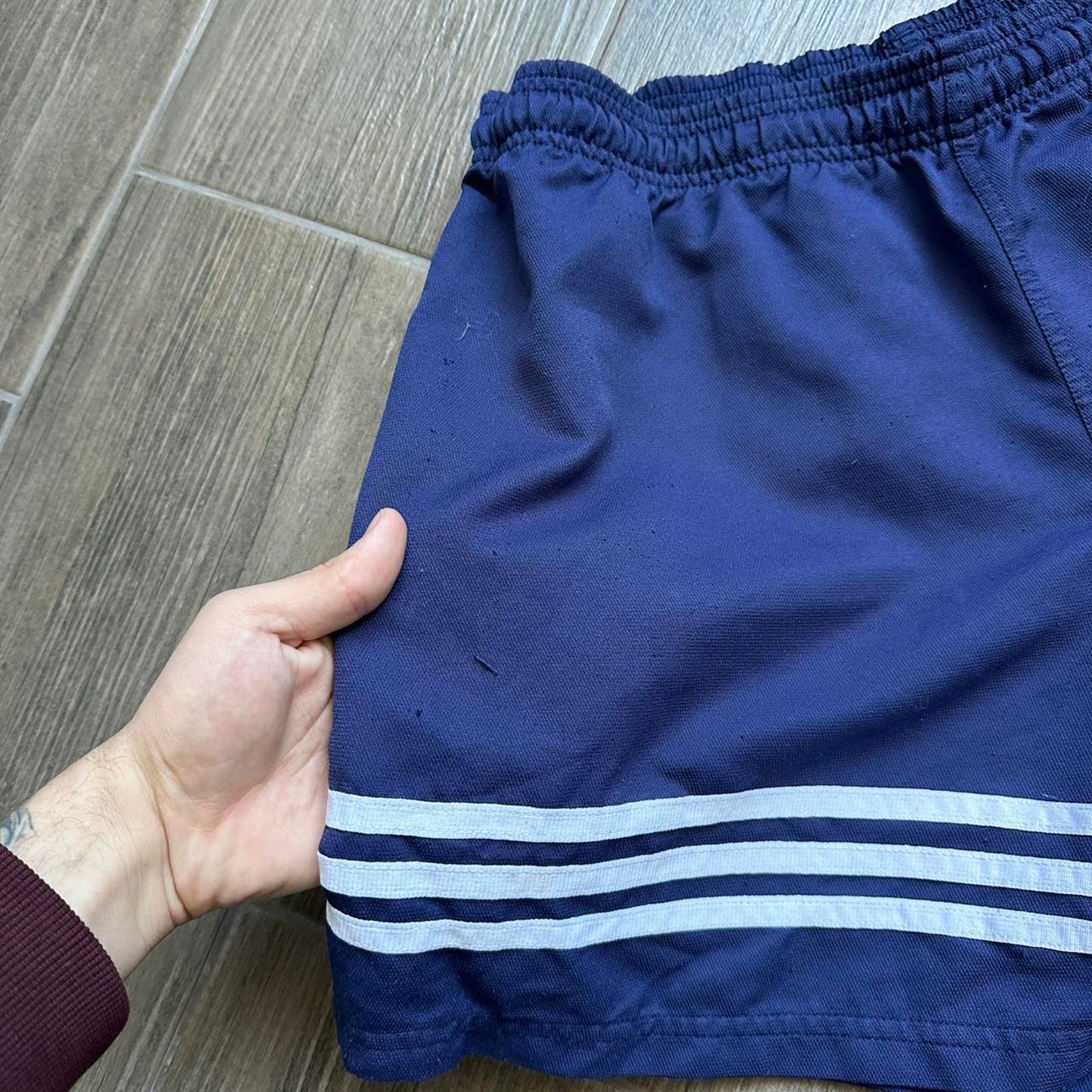 Adidas navy blue shorts with white stripes