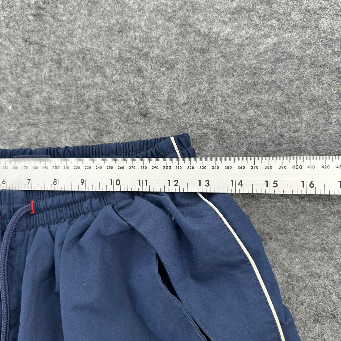 Navy umbro track shorts with