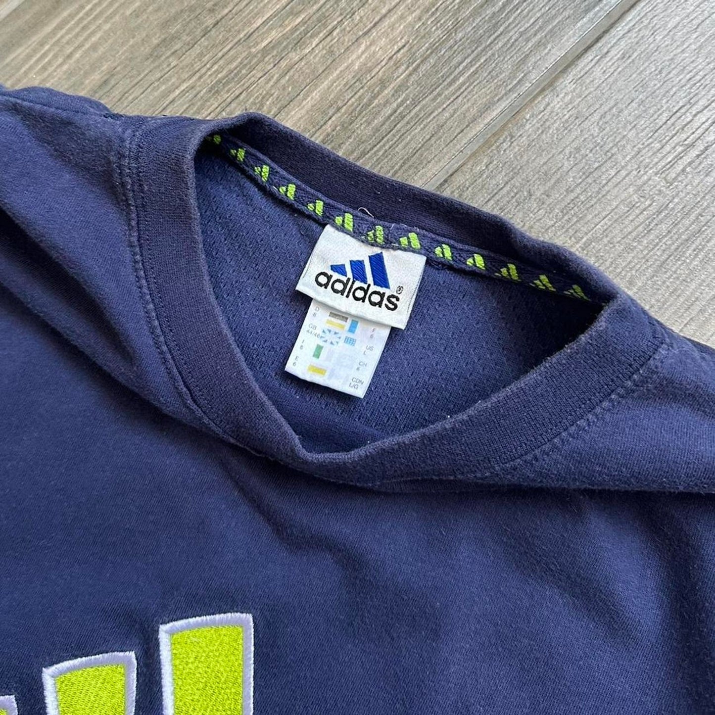 Adidas navy blue t-shirt with yellow and white logo