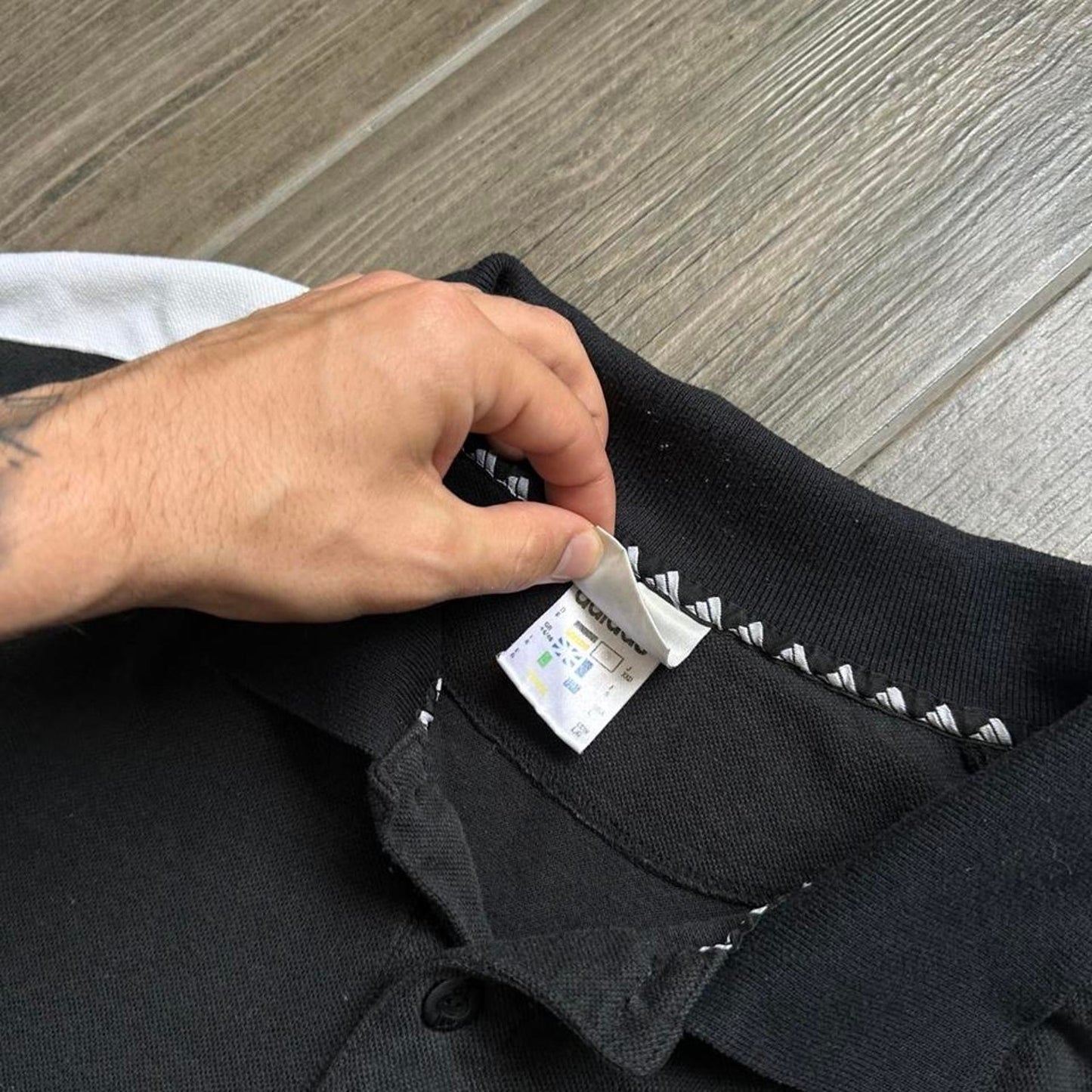 Adidas black polo shirt with