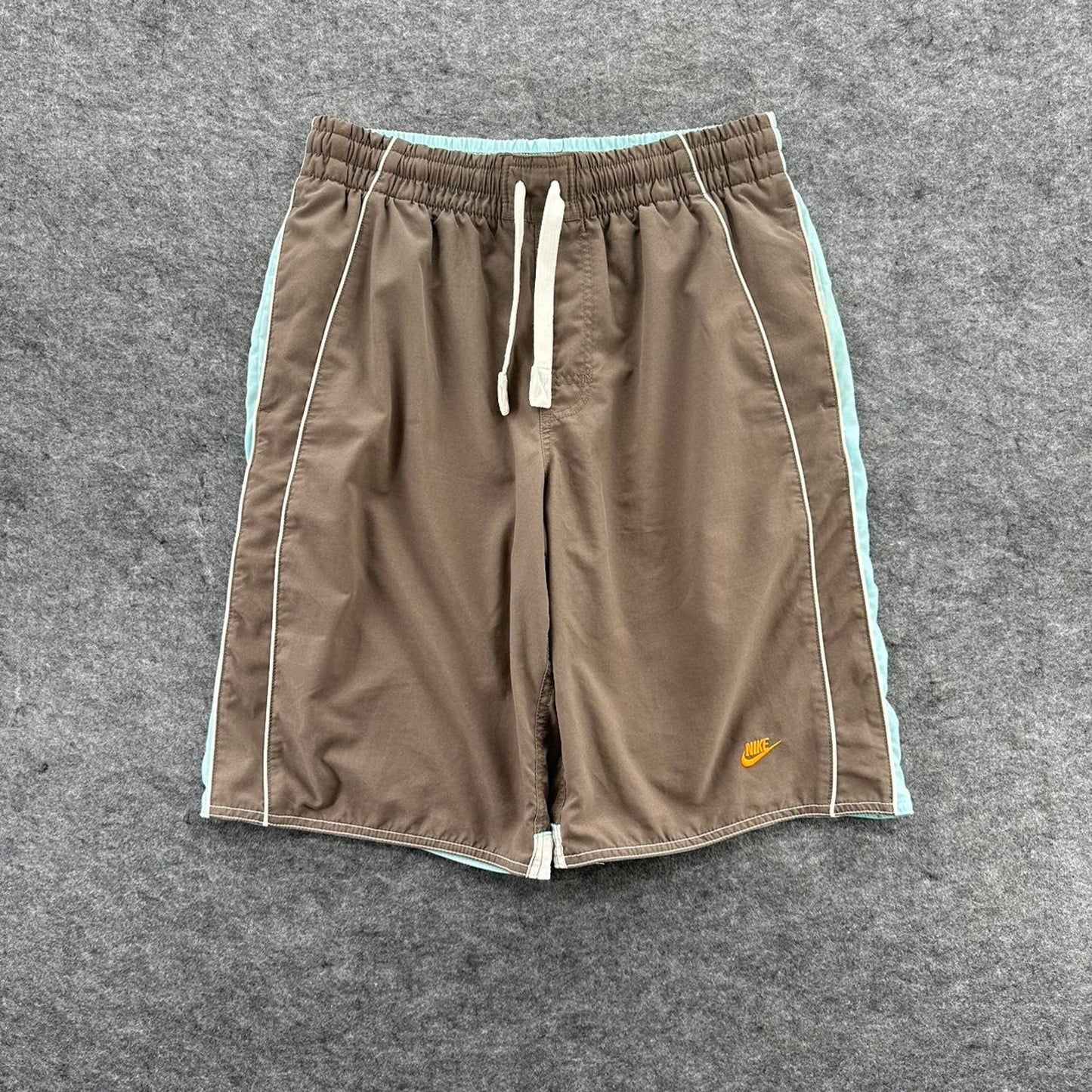 Nike brown shorts with light