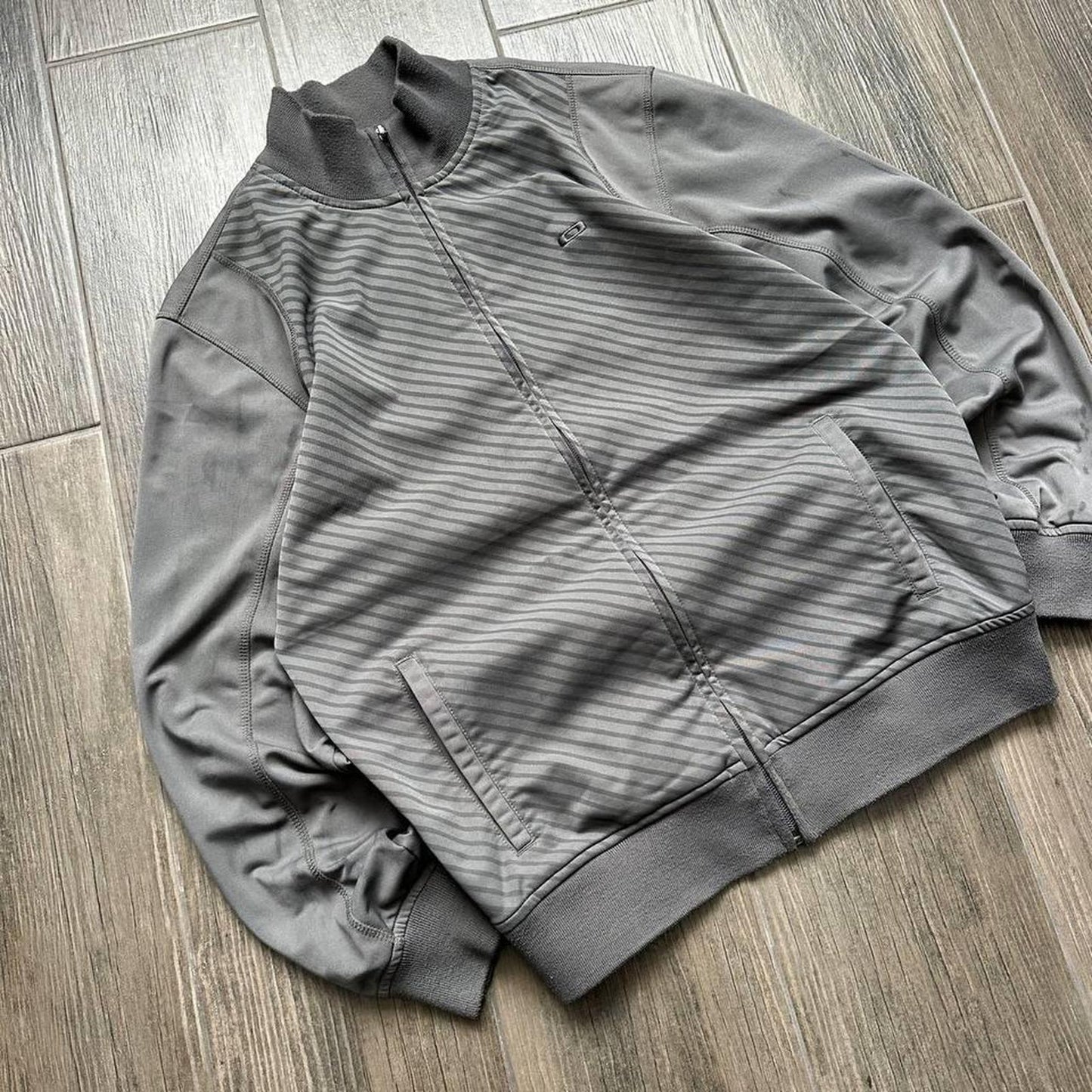 Oakley grey zip track top M jacket