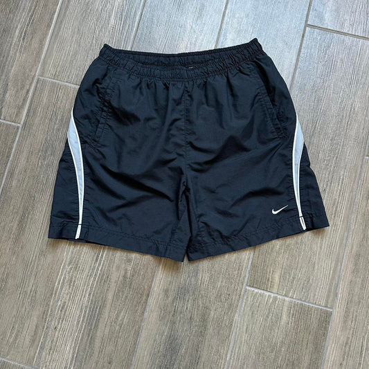 Nike black running shorts with white stripe