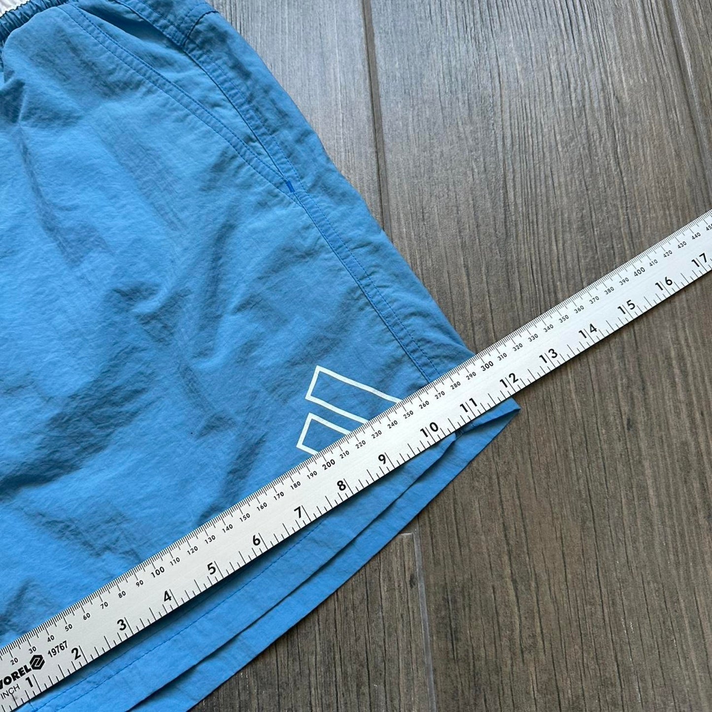 Adidas blue shorts with white