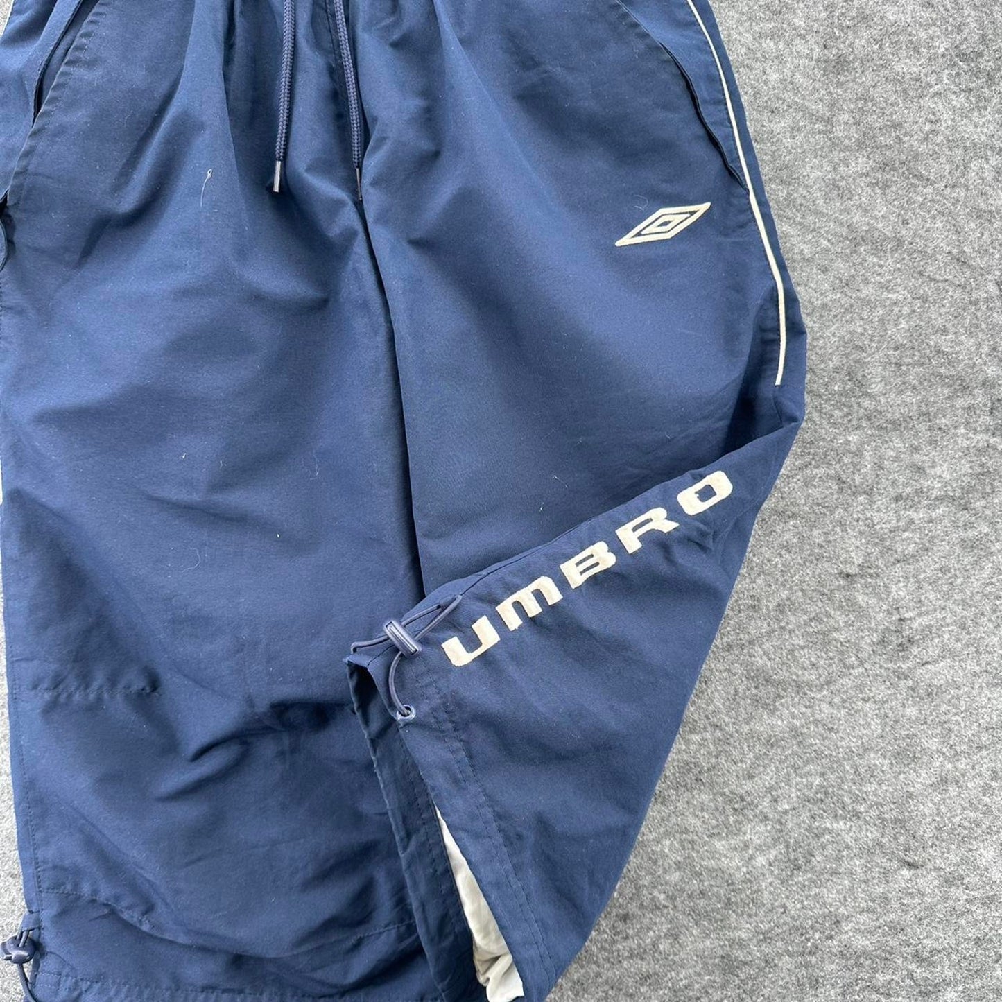 Navy umbro track shorts with