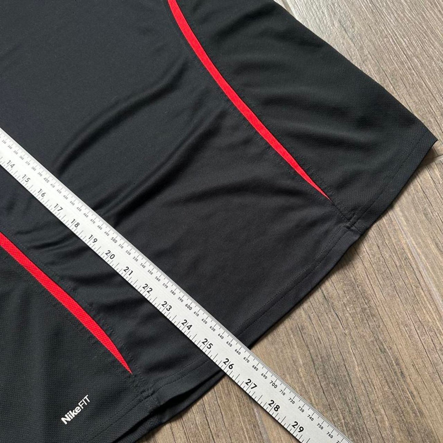 Nike black and red soccer jersey