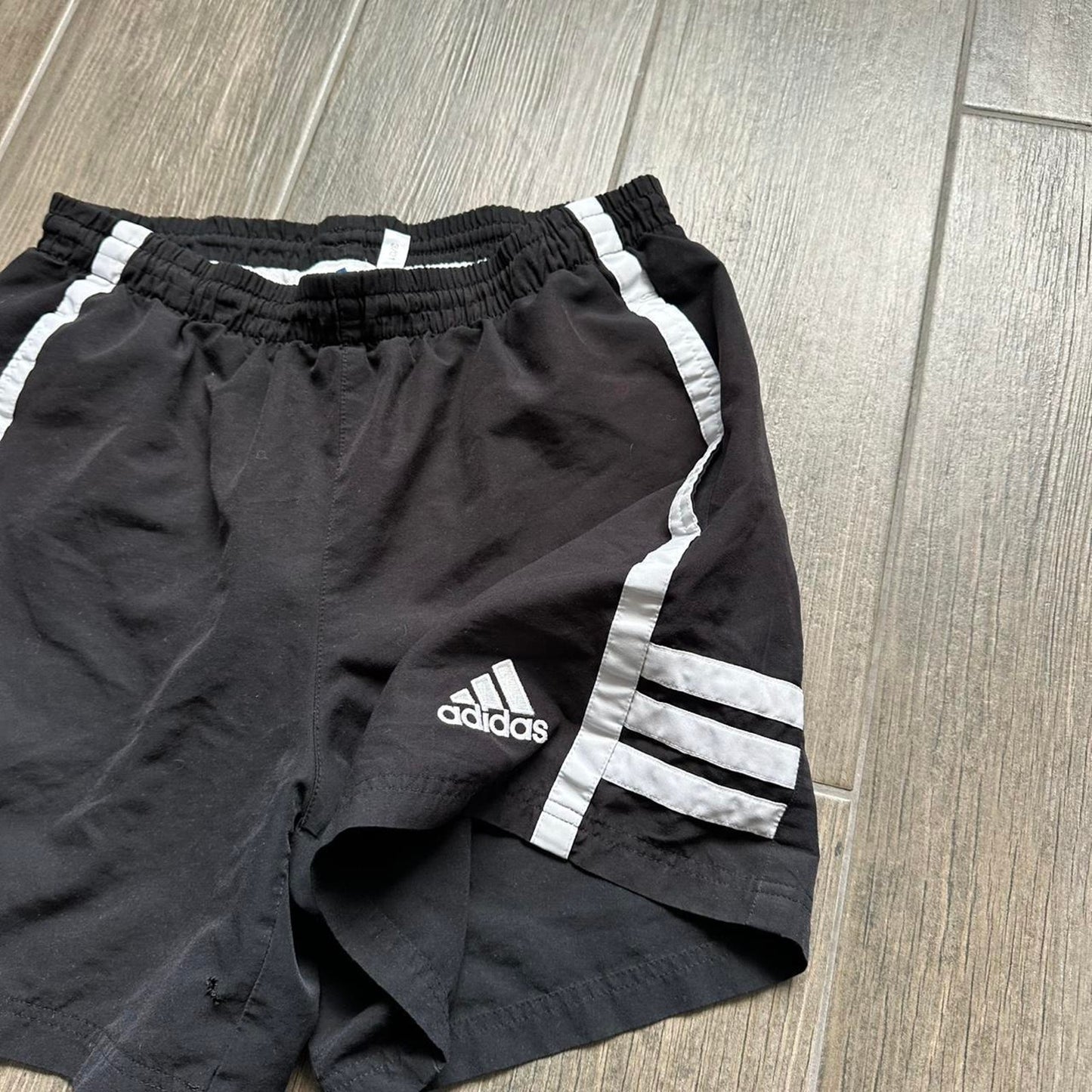 Adidas black shorts with white stripes