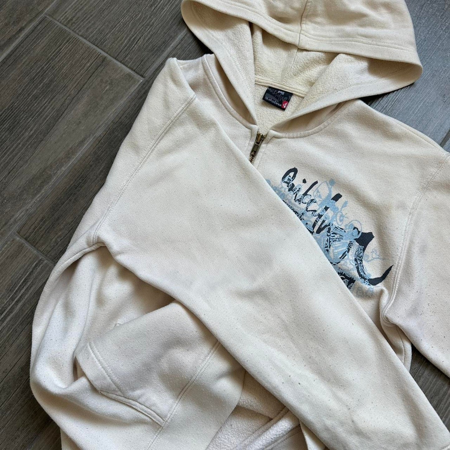 Quiksilver women cream zip up hoodie with blue graphic