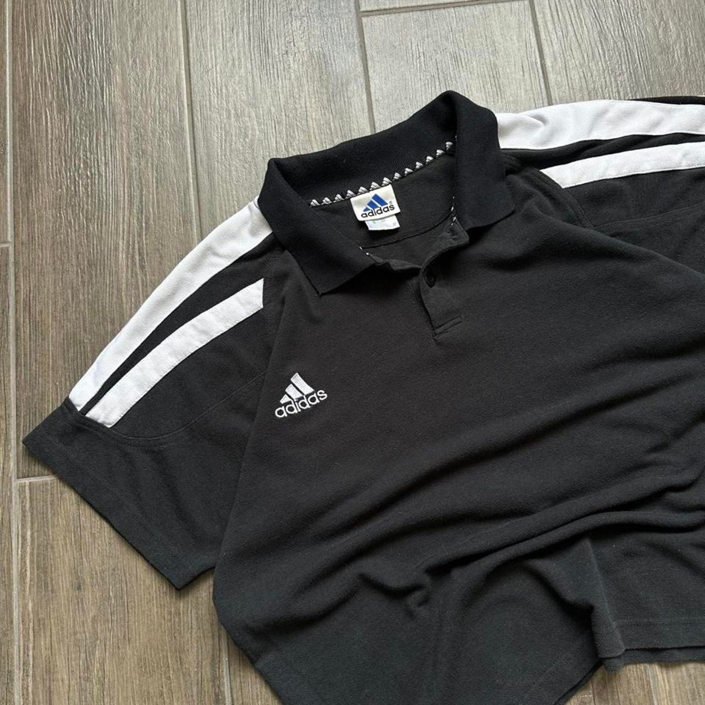 Adidas black polo shirt with