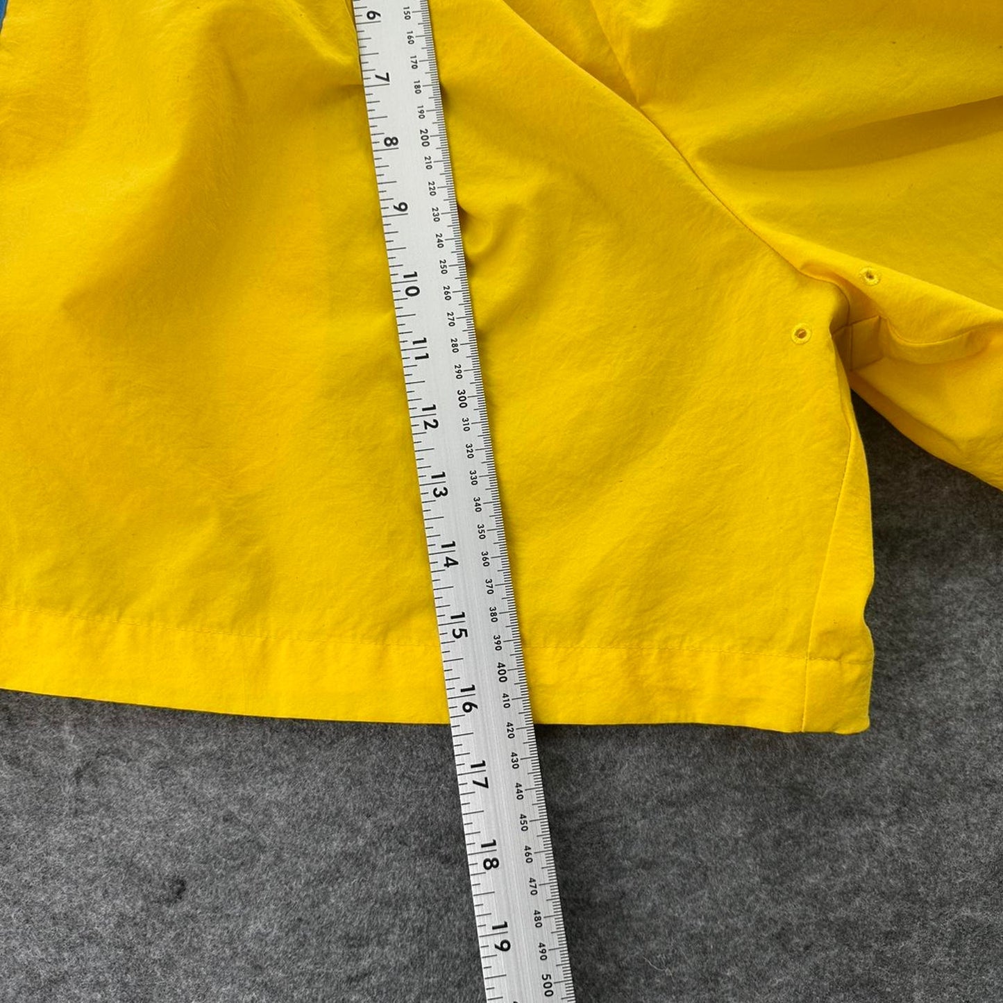 Nike yellow track shorts