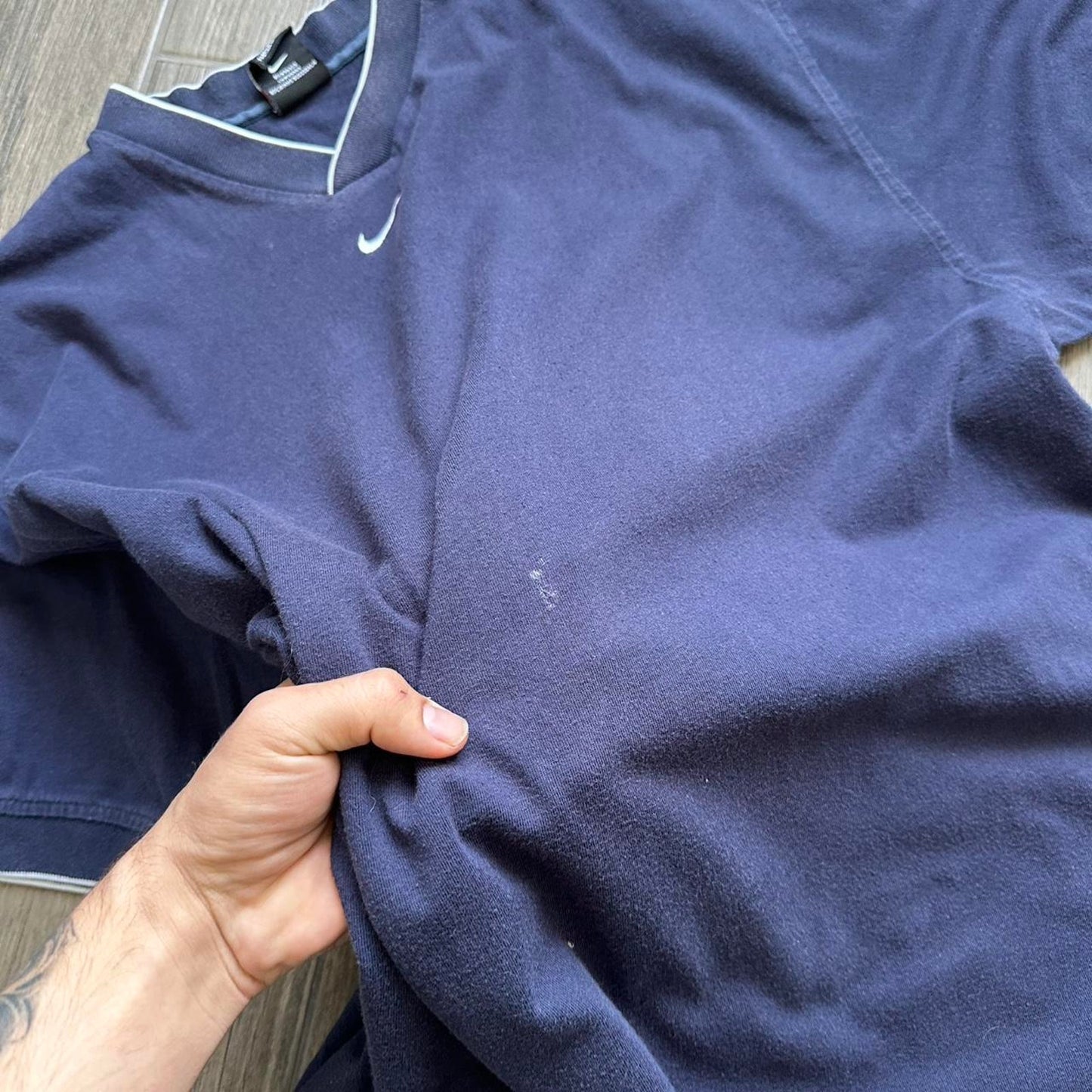 Nike navy blue V-neck t-shirt with white accents
